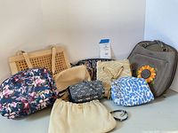 Group shot of all nine bags and pouches