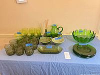 Full lot overview showing all glass and ceramic pieces