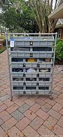 Front view of cart showing 24 bins filled with tools and hardware