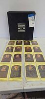 Front view of binder standing upright behind array of Hall of Fame plaque replica cards