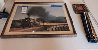 Overall lot with model train car, framed print and small frame