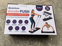 Front of Quantum WonderPUSH box showing product image and features