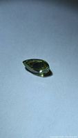 Pear cut green sapphire front view