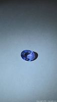 Front view of oval faceted tanzanite