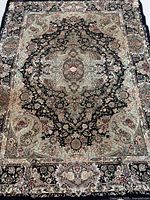 Full view of rug front side showing design and condition