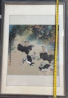 Front view showing full framed painting with tape for scale