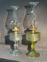 Both oil lamps fully assembled showing height and pattern
