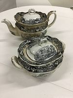 Both lidded pieces side by side showing overall form and matching pattern
