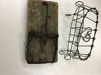 Rat trap next to wire soap dish overview