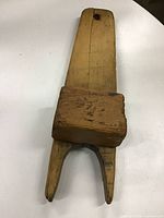 Top view of wooden boot jack showing overall form