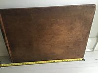 Front of full board with measuring tape showing length ~48 in