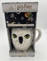Front of boxed Hedwig 3D mug showing design and branding
