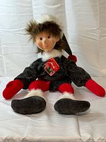 Full view of elf plush seated showing overall outfit and size
