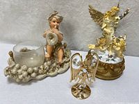 Group shot of all three angel figurines