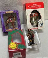 All three boxed ornaments grouped