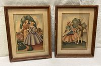 Both framed prints side by side showing frames, mats, overall design