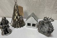 Group shot of all four metal décor items