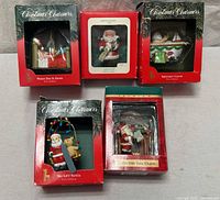 Five boxed ornaments arranged for group view