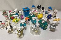 Group shot of all Dalmatian figurines and accessories