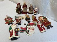 Group shot of all wood and resin Christmas ornaments laid out