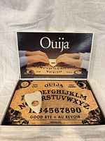 Open box showing board and planchette