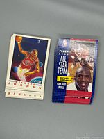 Two stacks of Fleer 1991 era NBA cards, top cards Michael Jordan standard and All-Star