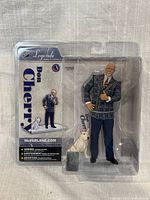 Front view of sealed Don Cherry figure in packaging with dog accessory visible