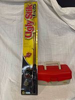 Packaged Shakespeare Ugly Stik Jr. combo beside Plano tackle box