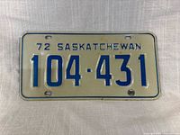 Front of 1972 Saskatchewan license plate showing serial number and colour