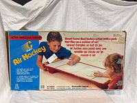 front of box with Cooper Air Hockey branding