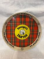 Top view showing tartan design and branding