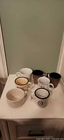 All seven assorted mugs grouped together