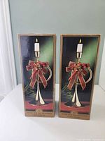 Retail boxes showing product artwork, two identical boxes