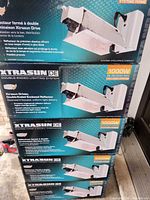 Five sealed Xtrasun DE 1000W system boxes stacked