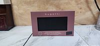 Front of retail box showing Bugatti branding and product window