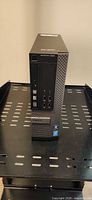 Front view of Dell OptiPlex 9020 SFF showing optical drive, USB ports, audio jacks, power button