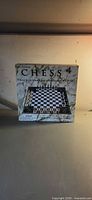 Front of Chess 4 box showing board illustration and branding