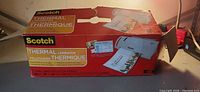 Front of retail box showing Scotch Thermal Laminator branding