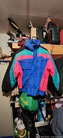 Front view of Sunice ski jacket showing colour-block design and overall condition