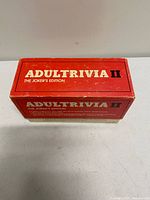 Closed box top view showing title Adult Trivia II The Joker’s Edition