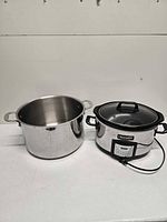 Cuisinox stock pot and Crock-Pot slow cooker side by side