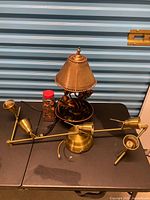 Group shot showing lamp, spotlight fixture and jar of pennies