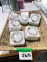 Six Intermatic timers in basket, overall view