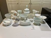 Group shot of all milk glass pieces on tabletop