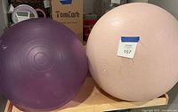 Front view of both balls showing colors and inflation
