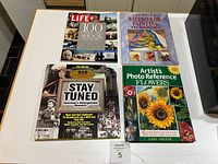 Front covers of the four books