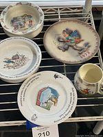 Group shot of five pieces on shelf