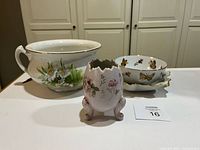 All three porcelain pieces grouped