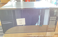 Front view of Panasonic countertop microwave with digital keypad and inverter branding