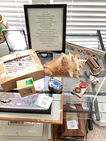 Overall view of lot on glass table